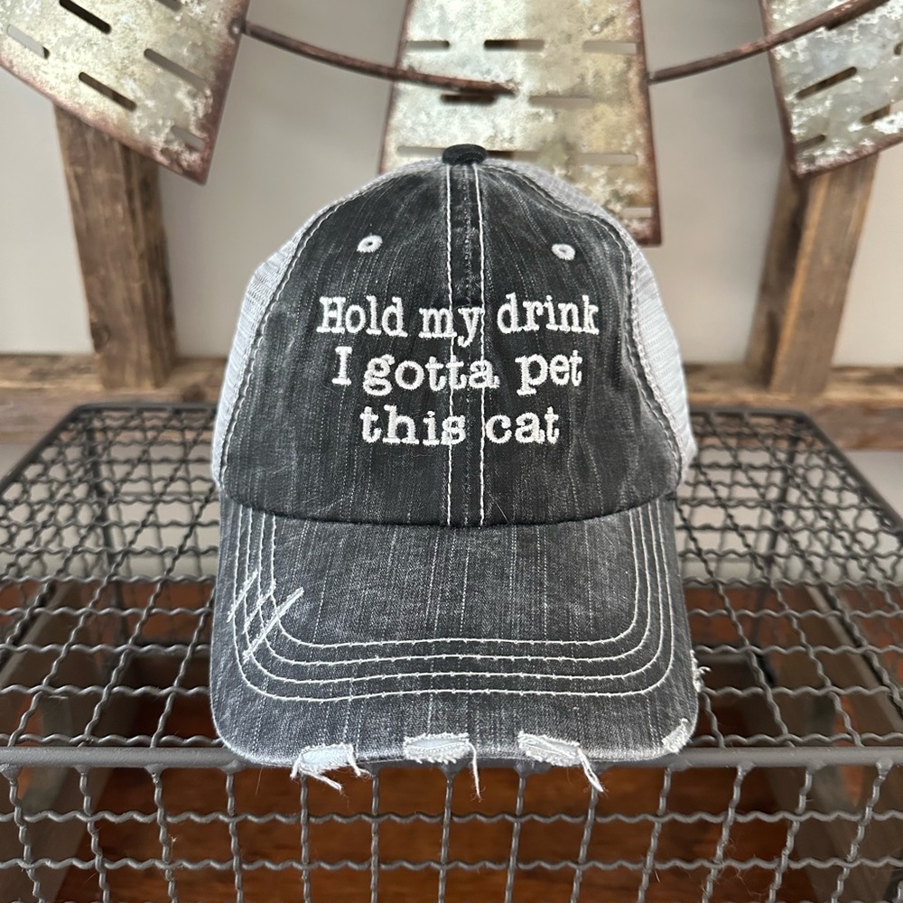 Distressed Black and White “Hold my drink I gotta pet this cat” baseball hat.